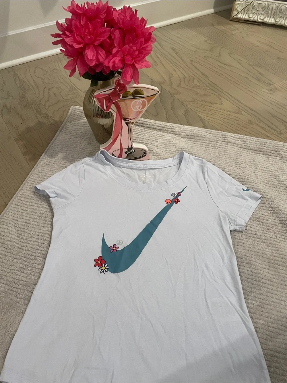 Nike White Tee with Teal Swoosh and Small Floral Accents
